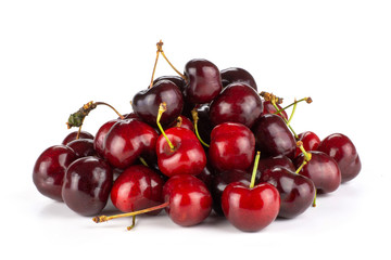 Sweet bright red cherry stack isolated on white...........................................................................