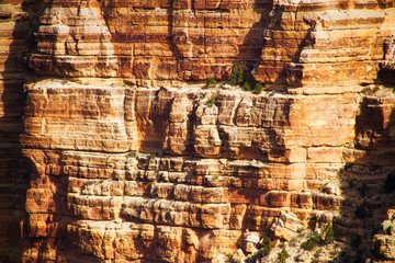 The layered rock faces of the cliffs of the Grand Canyon providing copy space.