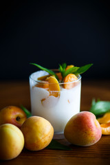 homemade yogurt with ripe apricots