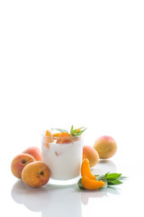 homemade yogurt with ripe apricots