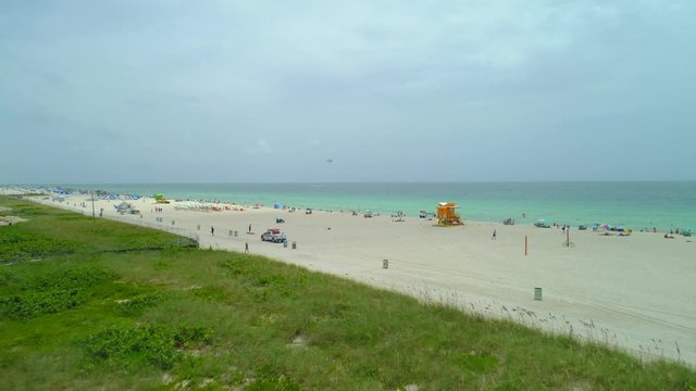 Aerial drone reveal Miami Beach summer sand and ocean