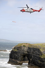 Fototapeta na wymiar two irish search and rescue helicopters at the virgin rock