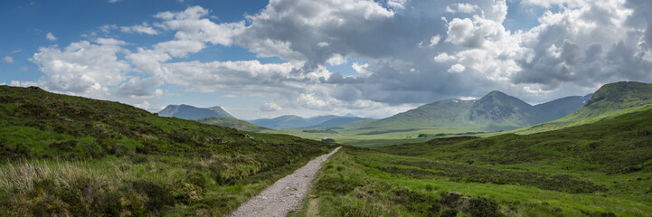 Fototapeta na wymiar a view of the west highland way in the highlands of scotland during a bright summer day