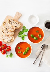 tomato soup flat lay on white backgorund