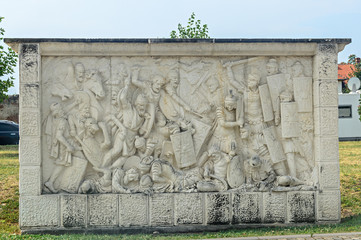 ALBA IULIA, ROMANIA - AUGUST 6, 2017: Citadel fortress Alba Carolina, detail of a sculpture describing the fight between dacians and romans