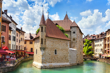 .Medieval castle on the canal in the French city of Annecy resort. Department of Upper Savoy. France. - obrazy, fototapety, plakaty