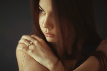 Obraz premium Fashion portrait of a young beautiful adult brunette girl