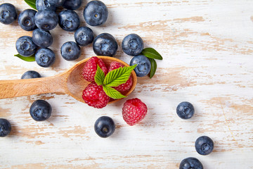 oatmeal porridge with raspberry and blueberry.