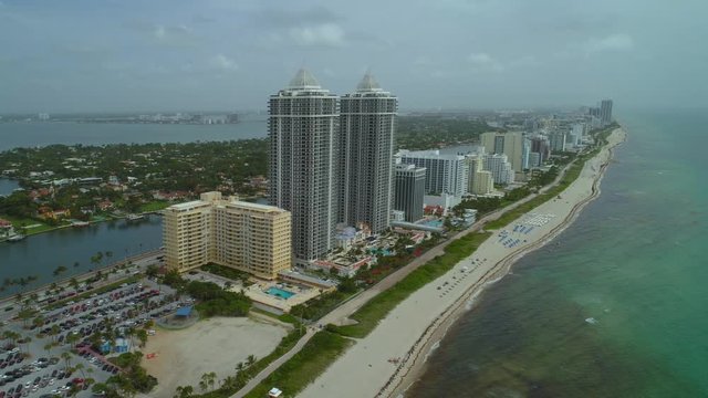 Aerial Miami Beach Atlantic Ocean beachfront condominiums 4k 24p