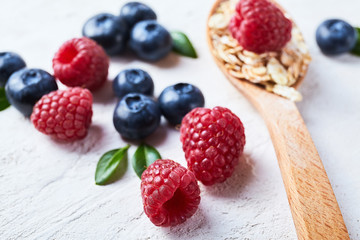 oatmeal porridge with raspberry and blueberry.