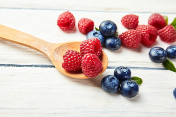 Ripe fresh raspberry and blueberry close up