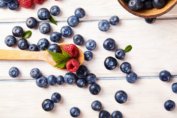 Ripe fresh raspberry and blueberry close up