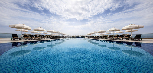 Infinity pool and sun beds