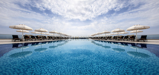 Infinity pool and sun beds