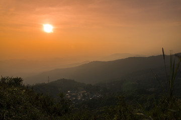 twilight sky and silhouette mountain and Doi Pui village