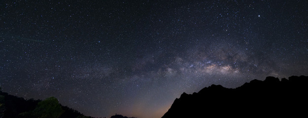 panorama milky way galaxy over mountain in dawn