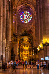 Tourists inside the Cathedral of Santa Maria of Palma, also known as La Seu © Jeanne Emmel