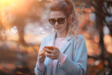 walk in autumn park / beautiful girl in autumn park, model female happiness and fun in yellow trees  October