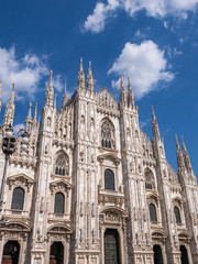 Fototapeta na wymiar Milan, Italy - June 2018 : Famous Milan Cathedral (Duomo di Milano), view of the architecture details, west facade 