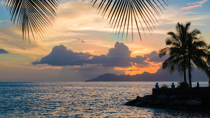 Scenic landscape of Tahiti at sunset. - obrazy, fototapety, plakaty