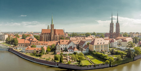 Poland. Wroclaw. Ostrow Tumski, park, and Odra River. Aerial 4K video.