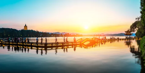 Selbstklebende Fototapeten Melone Beautiful Hangzhou West Lake landscape at sunset  © ABCDstock