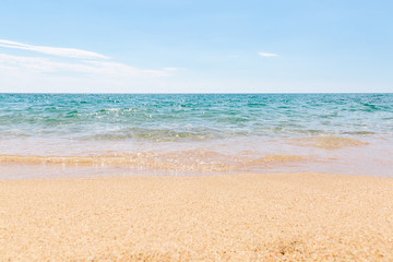 Fototapeta na wymiar Blue coast of Tyrrhenian sea with sand beach
