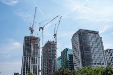 Construction site building two skyscrapers in city centre