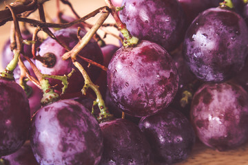 grapes on wood with filter effect retro vintage style
