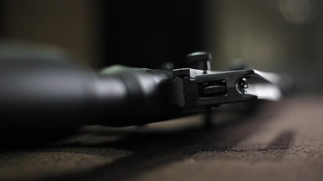 View of sighting tools tactical gun on the table
