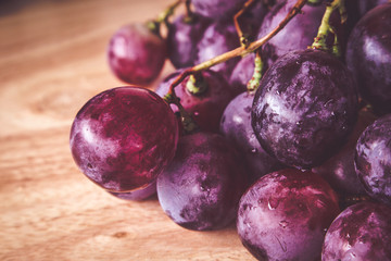 grapes on wood with filter effect retro vintage style
