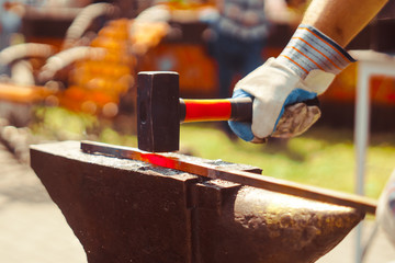 blacksmith forges iron