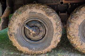 Fototapeta na wymiar Detail of a old dirty lorry wheel