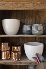 Empty Plant Pots on a Wooden Shelf