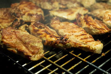 Cooking meat on barbeque grill