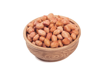 Shelled peanuts in brown cup isolated on the white background