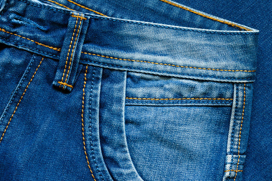 Details from blue jeans. Pocket.