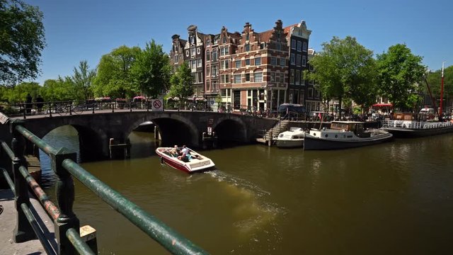 Bridge with crooked houses | Highlights of Amsterdam