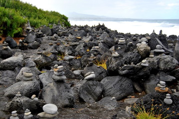 Reunion island seascape, landscape. Black sand, volcanic rocks.
