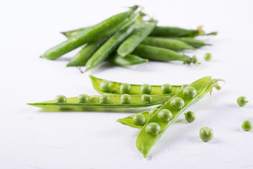 green pea pod, green peas,  on white background