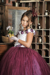 Vintage portrait of little girl in purple dress