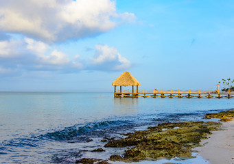 hot tropical day the Caribbean sea pier with pergola