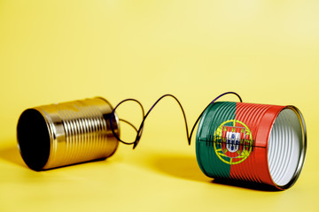 tin can phone with Portugal Flag .communication concept
