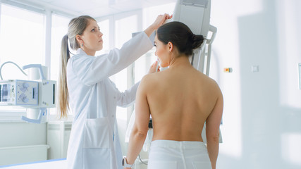 In the Hospital, Female Patients Undergoes Mammogram Screening Procedure Done by Mammography...
