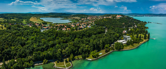 Tihany, Hungary - Aerial panoramic view of Lake Balaton with the Benedictine Monastery (Tihany Abbey, Tihanyi Apatsag) on top of the hill. This view includes the Inner lake and the harbor of Tihany