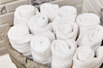 Obraz na płótnie Canvas towels coiled in a roll
