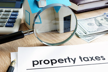 Document with title Property tax on a desk. - obrazy, fototapety, plakaty