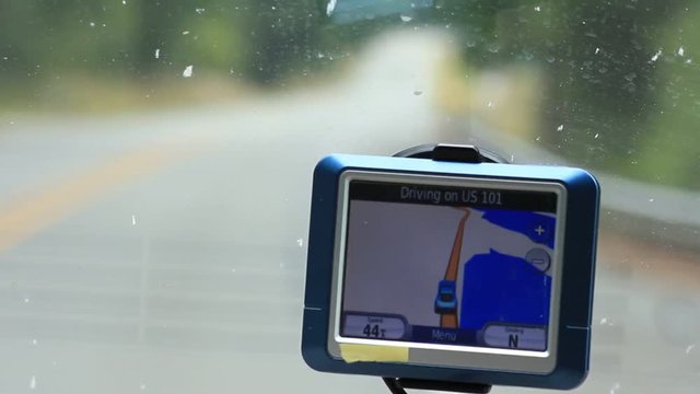 GPS in a car moving down the highway.