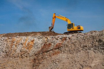 Obraz premium Backhoe are working digging on the ground