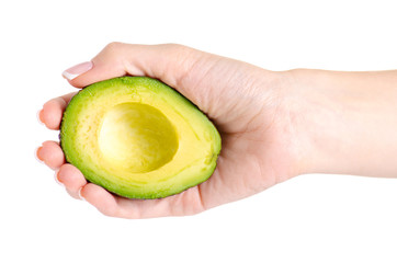 Avocado in hand on white background isolation